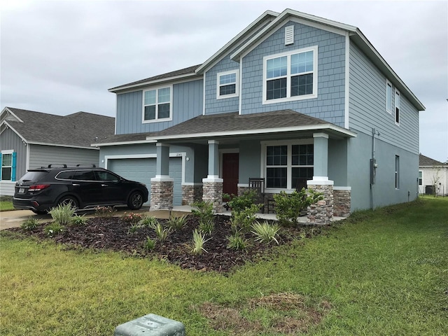 view of front of house with a front lawn and covered porch