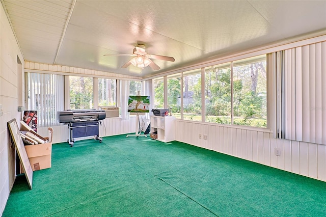 sunroom / solarium with ceiling fan