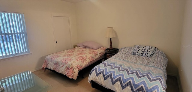 bedroom featuring carpet