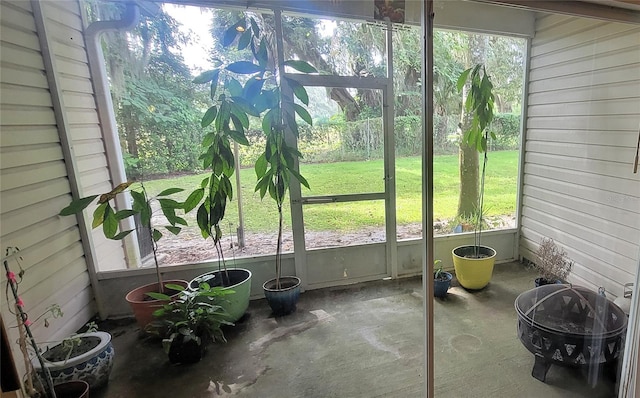 sunroom featuring a healthy amount of sunlight