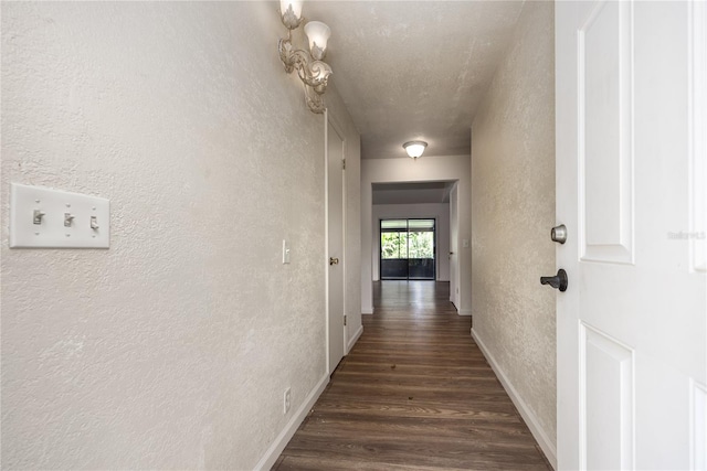 hall featuring dark wood-type flooring