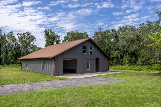 view of side of property featuring a yard