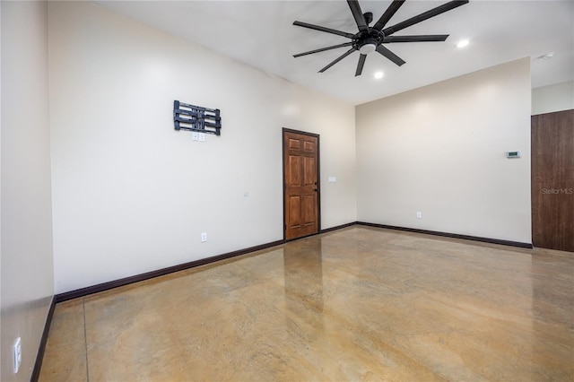 unfurnished room with concrete flooring and ceiling fan