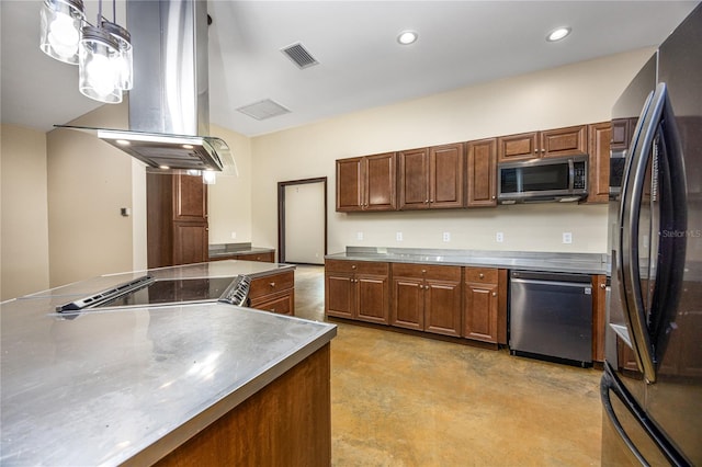 kitchen with island range hood, stainless steel counters, stainless steel appliances, and decorative light fixtures