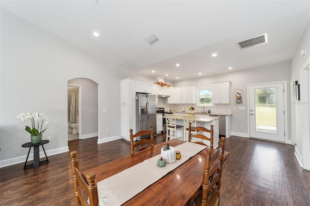 dining space featuring dark hardwood / wood-style floors and sink