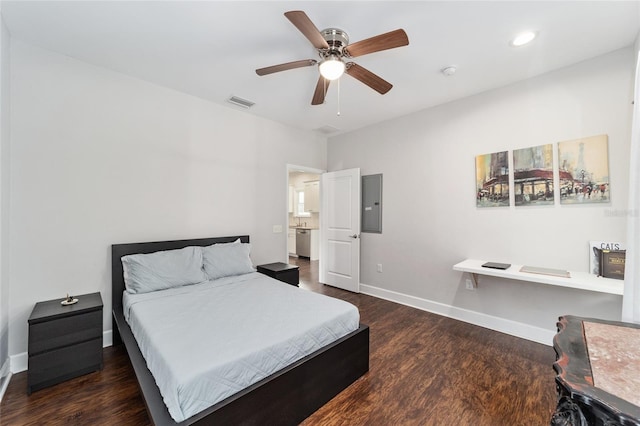 bedroom featuring dark wood-type flooring, electric panel, and ceiling fan