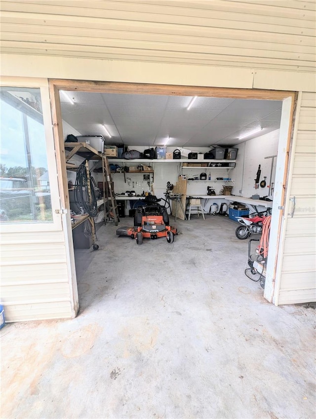 garage with a workshop area