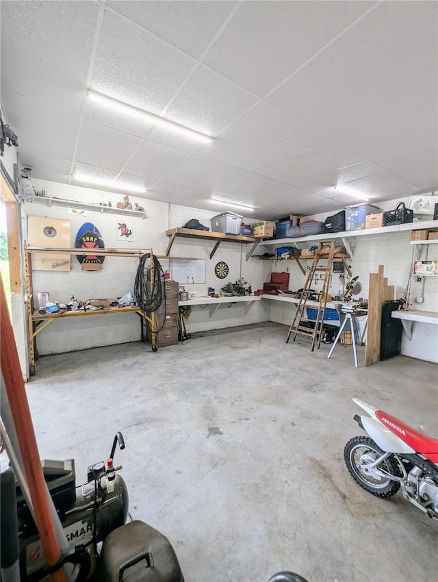 garage with a workshop area