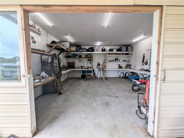 garage with a workshop area