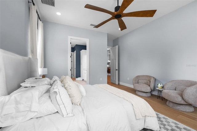bedroom with wood finished floors, visible vents, recessed lighting, and ceiling fan