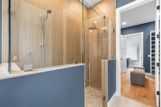 full bathroom featuring a shower stall