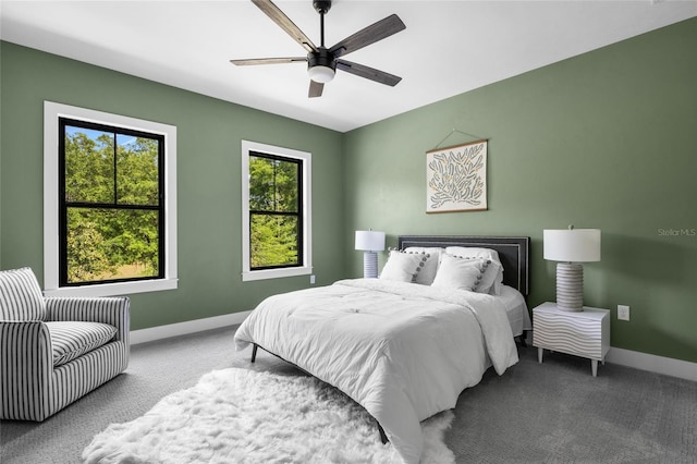 bedroom featuring a ceiling fan, baseboards, and carpet flooring