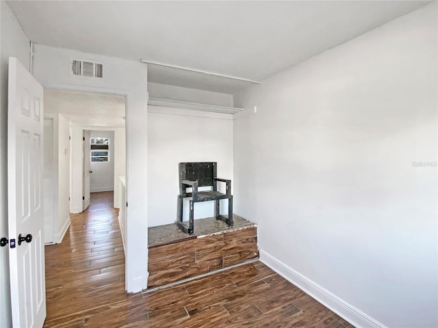 interior space with dark wood-type flooring