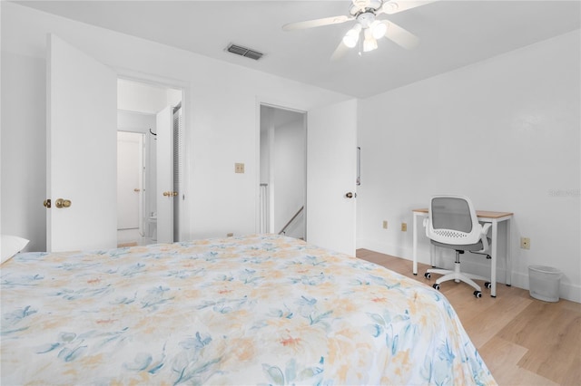 bedroom featuring ceiling fan and light hardwood / wood-style flooring