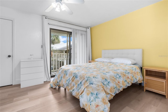 bedroom with access to outside, light hardwood / wood-style floors, and ceiling fan