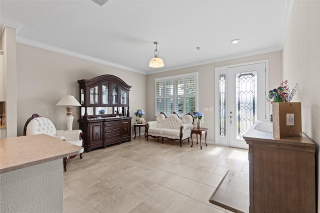 living area featuring ornamental molding and light tile patterned floors