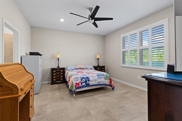 tiled bedroom featuring ceiling fan