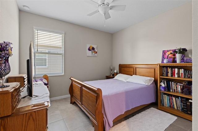 bedroom featuring ceiling fan and light tile patterned floors