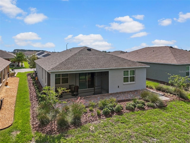 rear view of property with a patio area