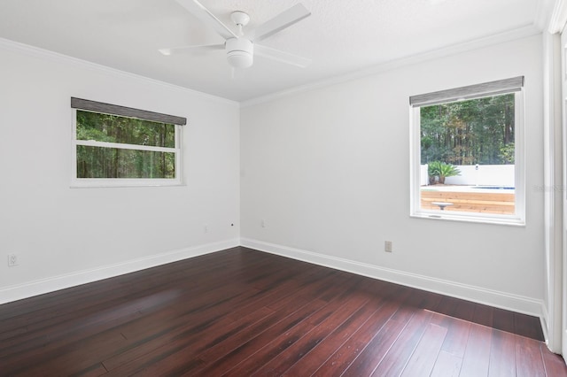 empty room featuring crown molding, ceiling fan, and hardwood / wood-style flooring