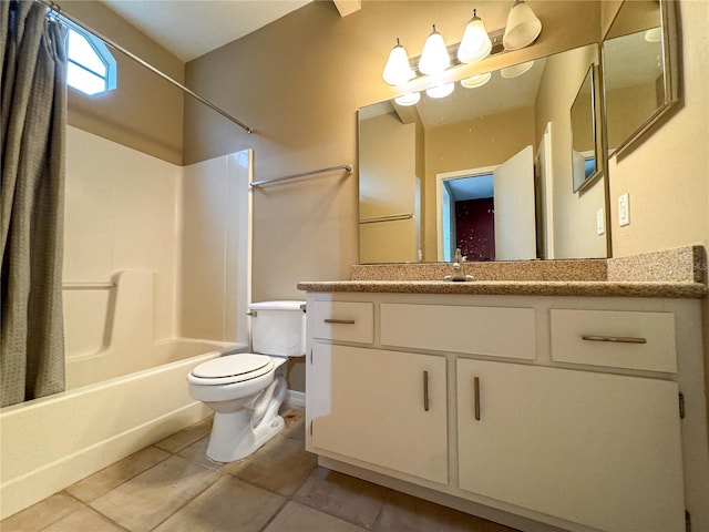 full bathroom with vanity, bathing tub / shower combination, toilet, and tile patterned floors