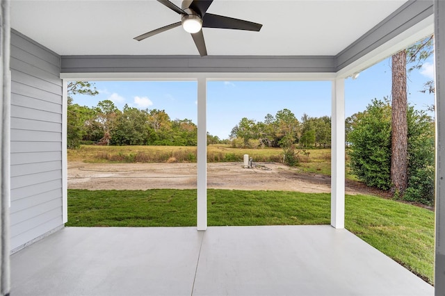 exterior space featuring ceiling fan