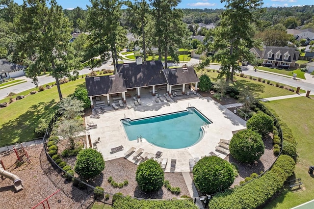 view of swimming pool with a patio