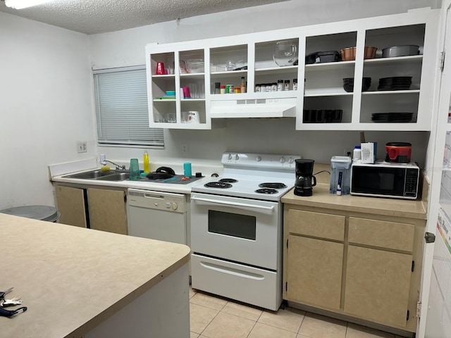 kitchen with a textured ceiling, sink, ventilation hood, white appliances, and light tile patterned floors