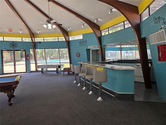 recreation room with dark carpet, ceiling fan, beam ceiling, high vaulted ceiling, and pool table