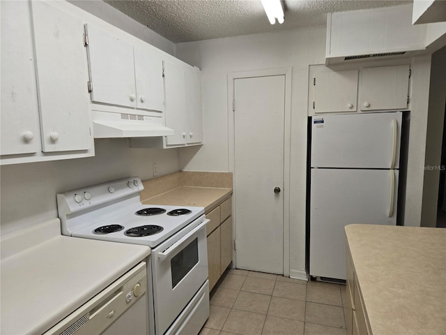 2811 SW Archer Rd Unit R-143, Gainesville, FL 32608 - kitchen featuring white appliances, under cabinet range hood, light countertops, white cabinets, and a textured ceiling