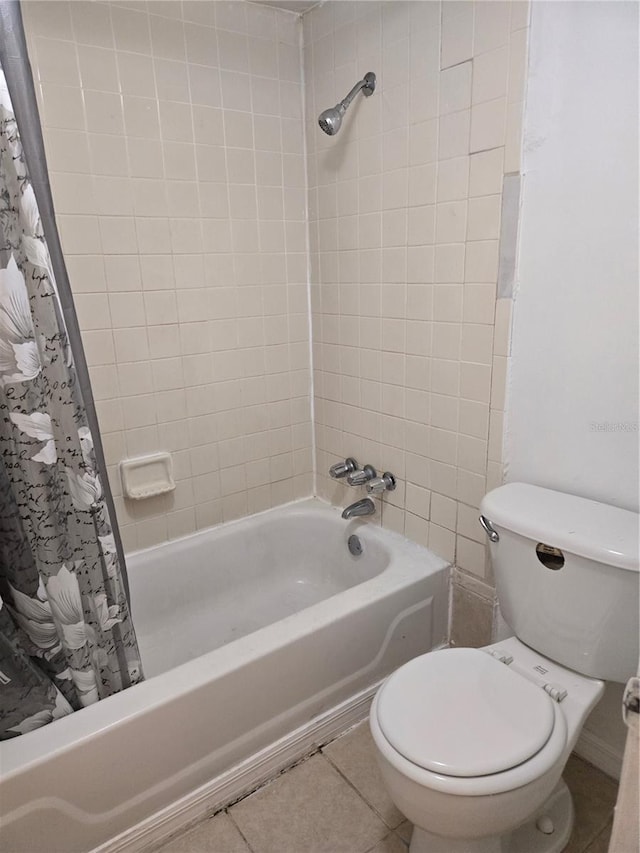 2811 SW Archer Rd Unit R-143, Gainesville, FL 32608 - full bath featuring toilet, shower / tub combo, and tile patterned floors
