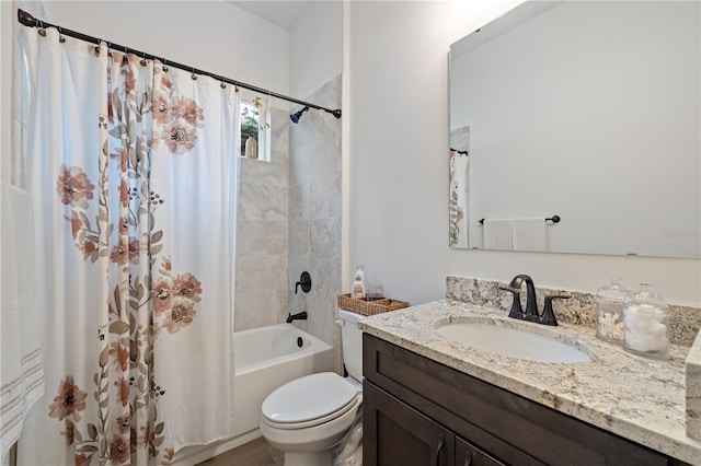 full bathroom with vanity, toilet, and shower / bath combo