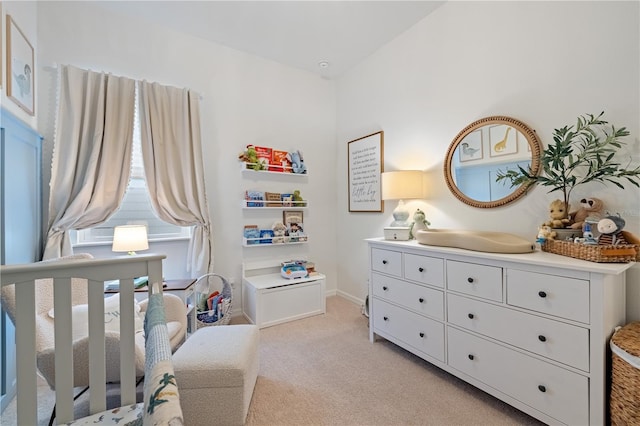 bedroom with light colored carpet