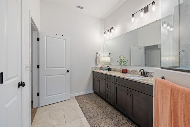 bathroom featuring vanity and tile patterned floors