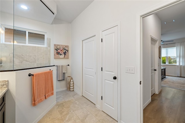 bathroom featuring vanity and hardwood / wood-style flooring