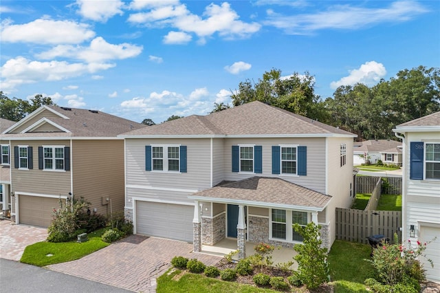 view of front of home with a garage