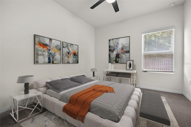 bedroom featuring lofted ceiling, carpet, and ceiling fan