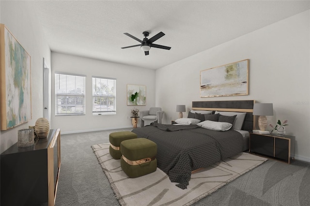 carpeted bedroom featuring ceiling fan and a textured ceiling