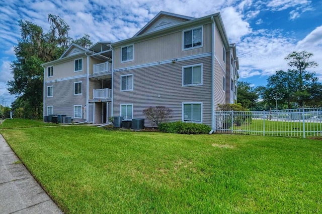 4000 SW 23rd St Unit 3-108, Gainesville, FL 32608 - view of building exterior featuring fence and cooling unit