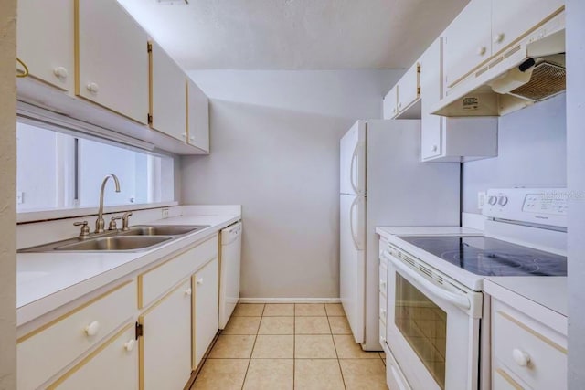 kitchen with white cabinetry, sink, white appliances, and light tile patterned floors