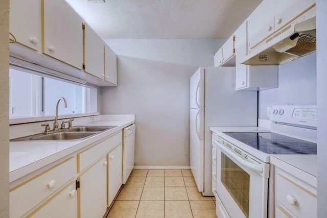 4000 SW 23rd St Unit 3-108, Gainesville, FL 32608 - kitchen with under cabinet range hood, white appliances, a sink, and light countertops