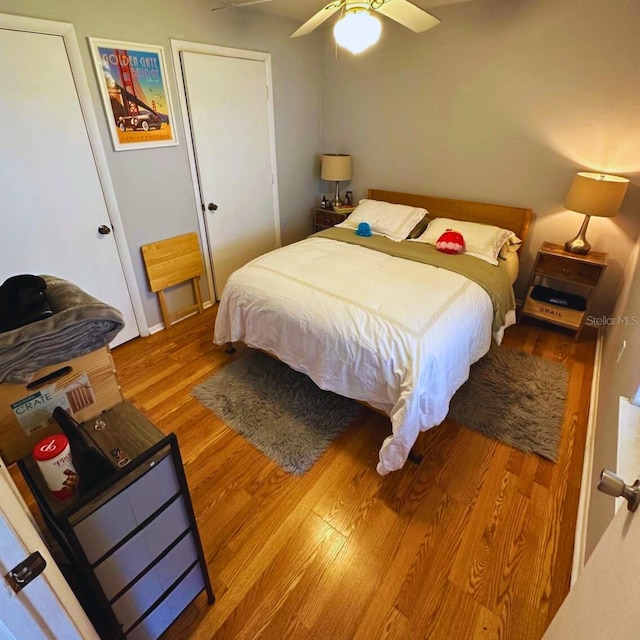 bedroom featuring ceiling fan and light hardwood / wood-style flooring