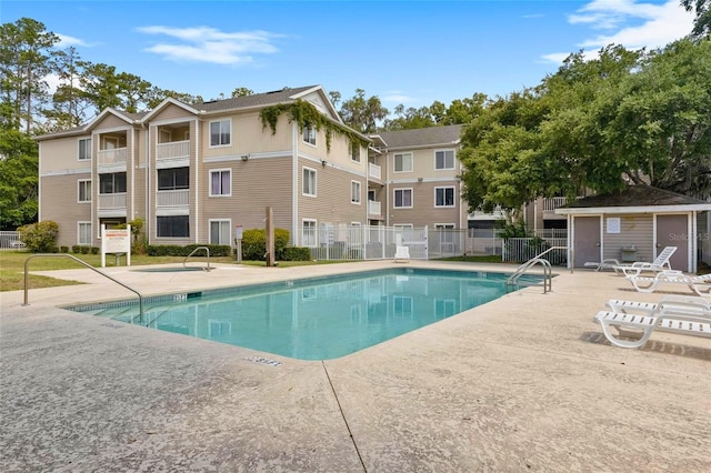 view of pool featuring a patio area