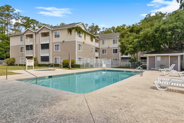 4000 SW 23rd St Unit 3-108, Gainesville, FL 32608 - pool with a patio area and fence
