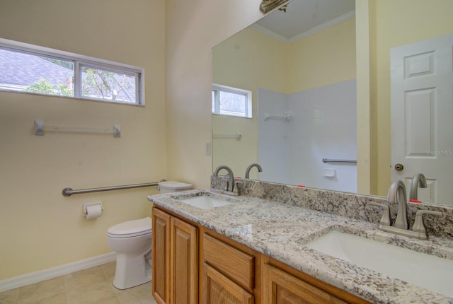 bathroom with ornamental molding, tile patterned flooring, vanity, and toilet