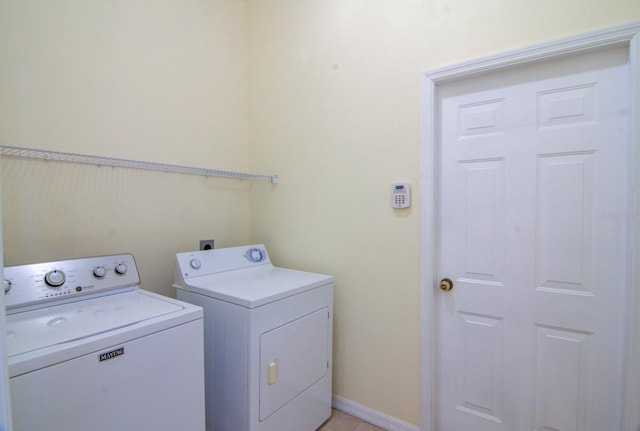 laundry area featuring independent washer and dryer