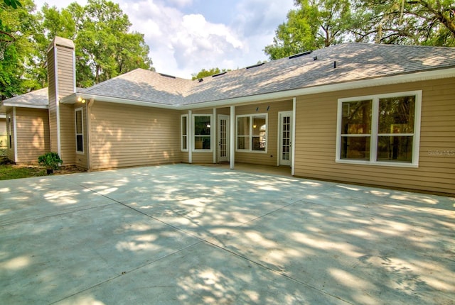 rear view of house featuring a patio area