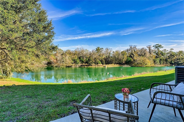 view of patio featuring a water view