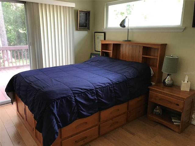 bedroom with light hardwood / wood-style flooring