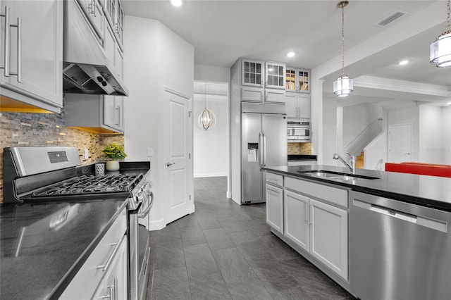 kitchen with white cabinetry, appliances with stainless steel finishes, and sink